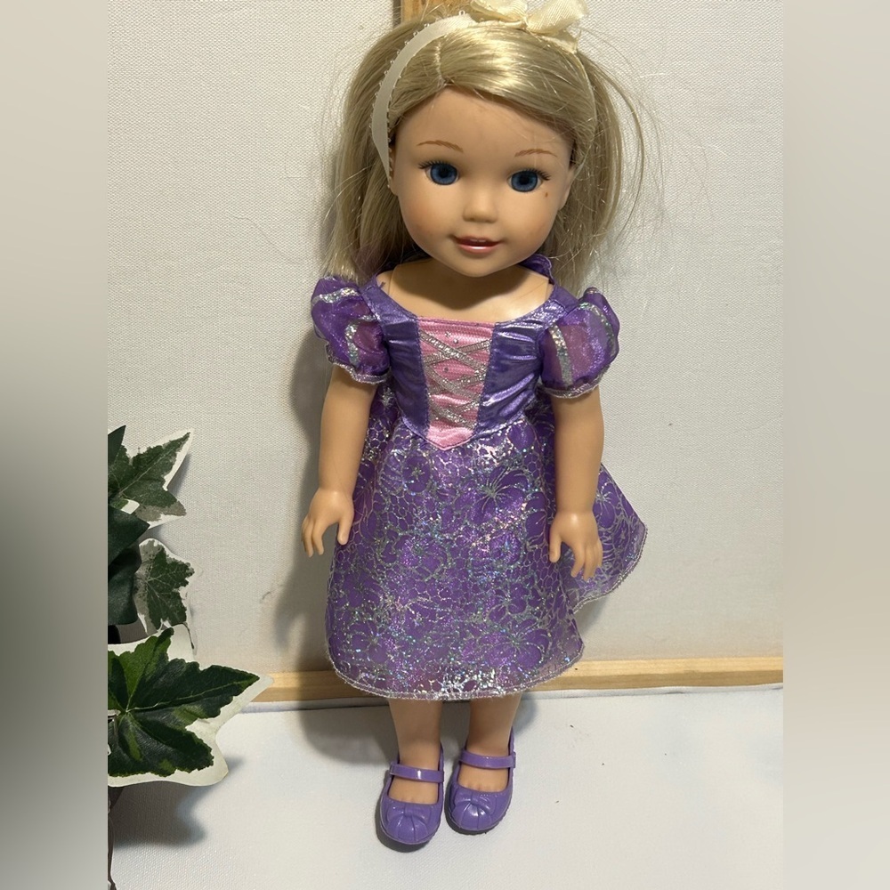 American Girl Doll in Sparkly Purple Dress